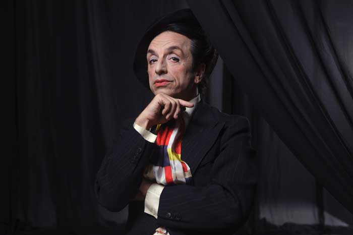 Paul Capsis as Quentin Crisp in Resident Alien.